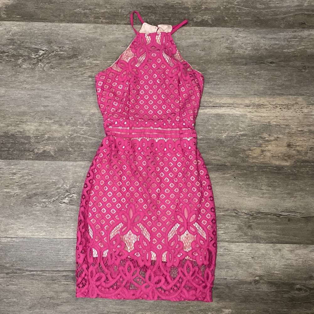 Fuchsia lace dress with nude under skirt and high neck